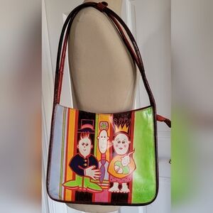 Colorful handpainted shoulder handbag in genuine leather.